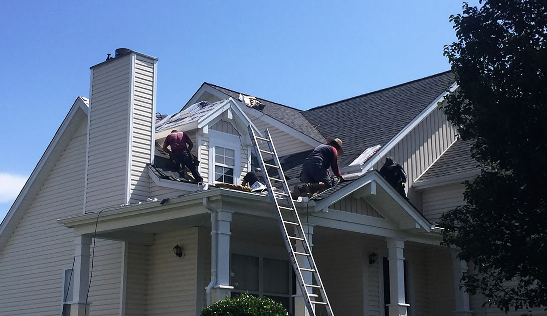 Dukes Exteriors Roofers Working Image